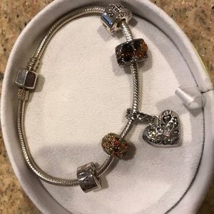 A Chamilia Charm Bracelet with 5 Charms